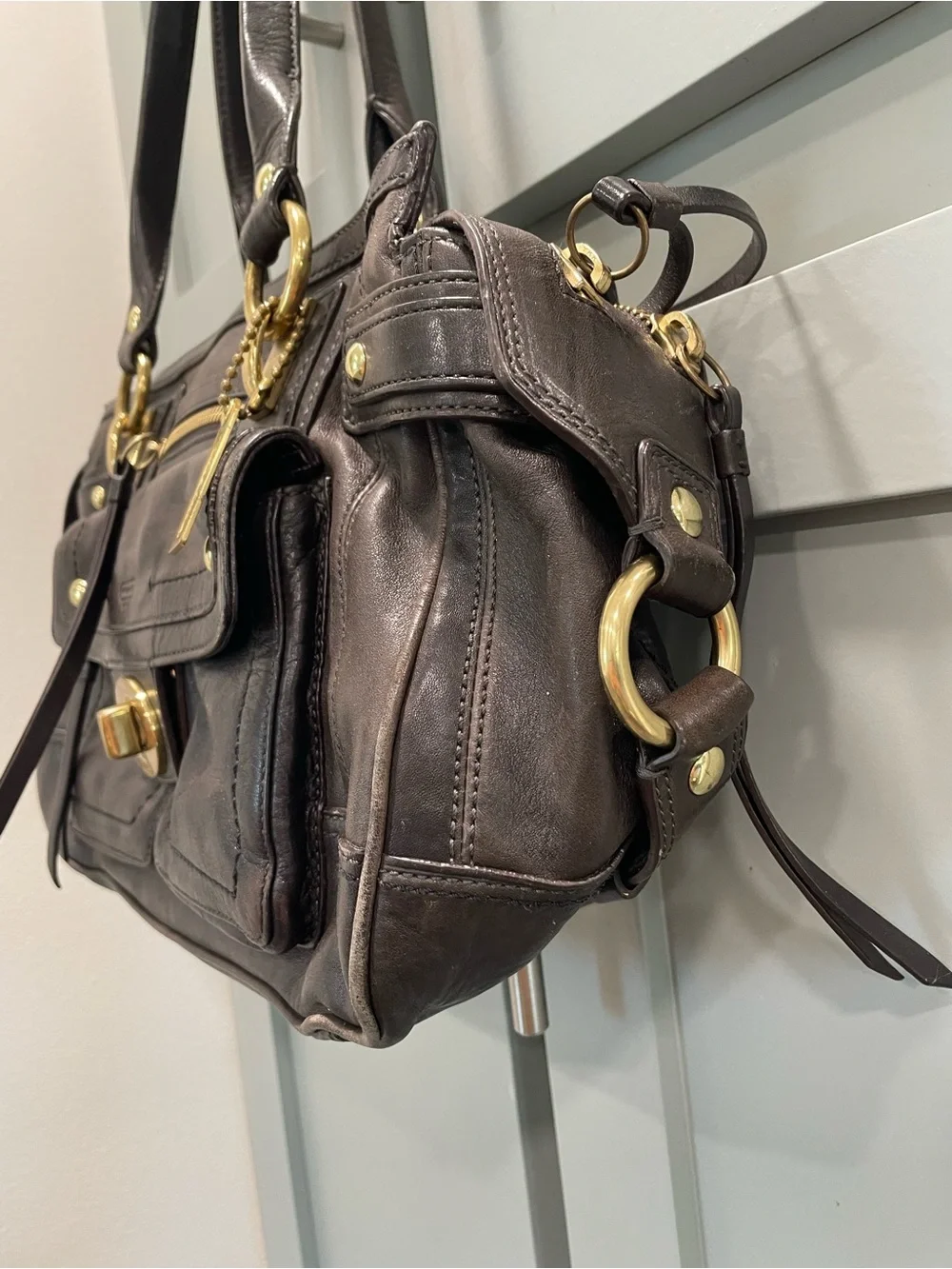 Coach Black Leather Handbag with Purple Lining